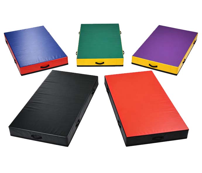 Set of five colorful vinyl martial arts crash mats in blue, green, purple, black and red with side carry handles