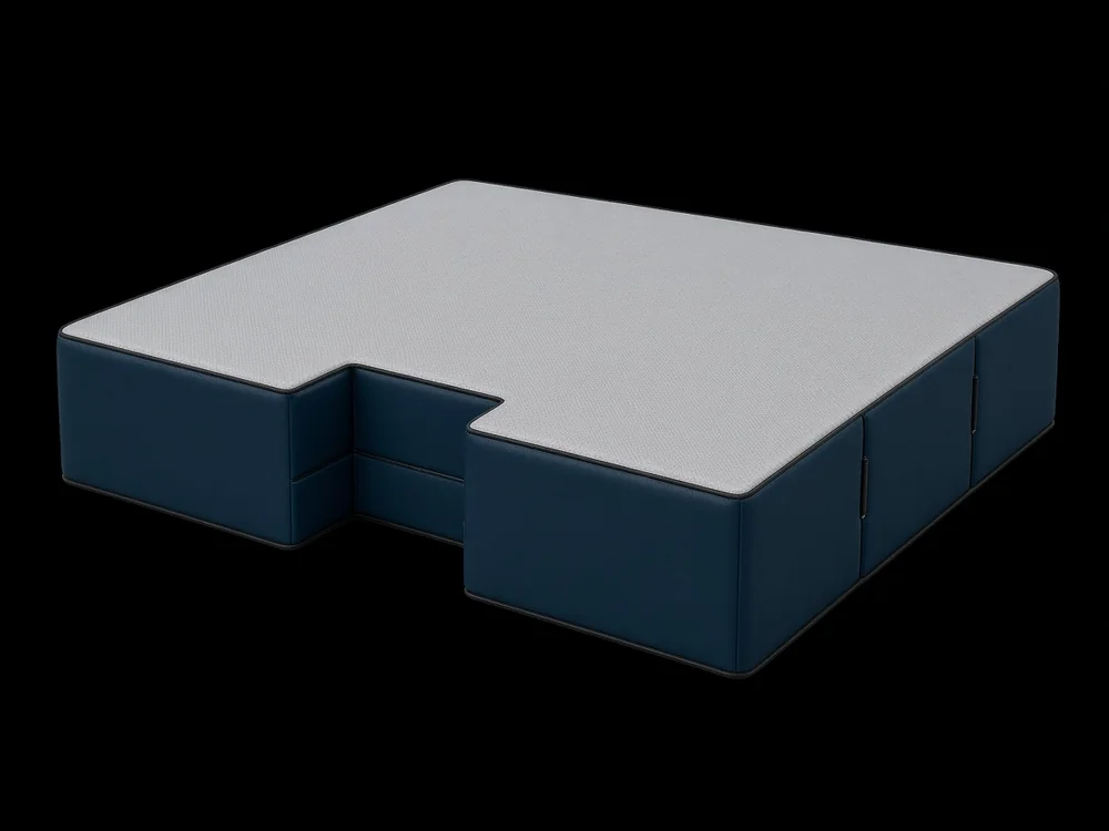 Studio view of a navy PVC-sided high jump landing mat with light gray top cover and notched front edge on a black background